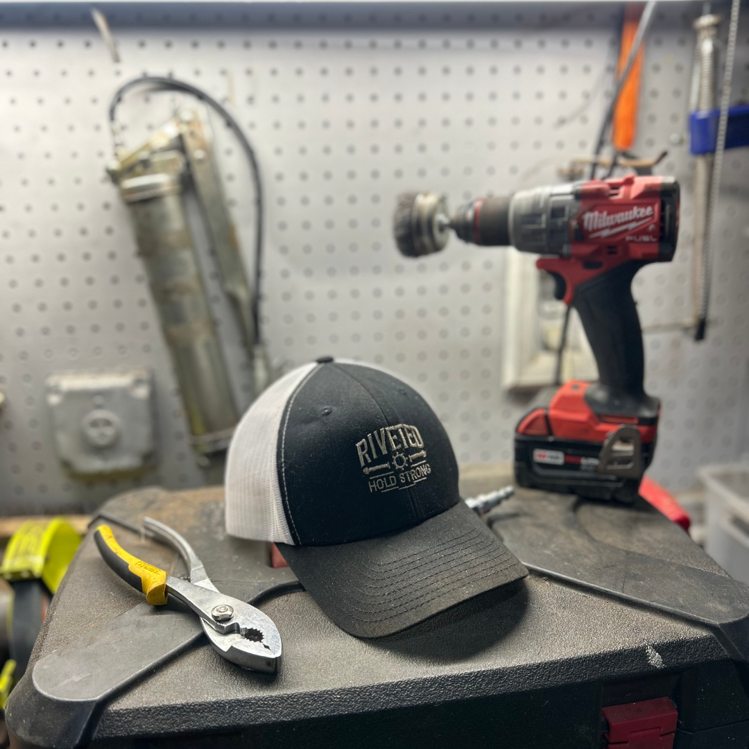 RIVETED Classic Trucker-Hold Strong Edition